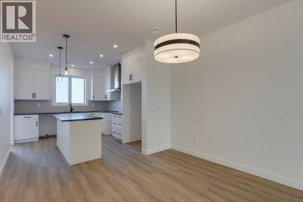 8546 Huxbury Drive Ne, Calgary, Alberta  T2A 4Y1 - Photo 11 - A2247764