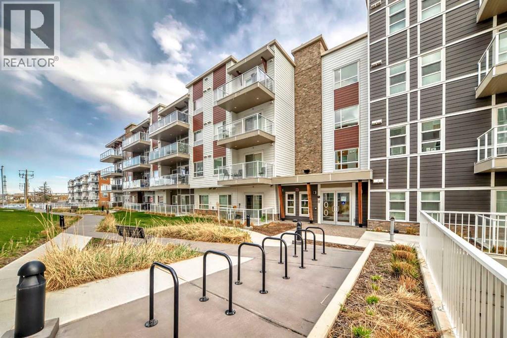 404, 100 Harvest Hills Place Ne, Calgary, Alberta  T3K 2M7 - Photo 2 - A2258585