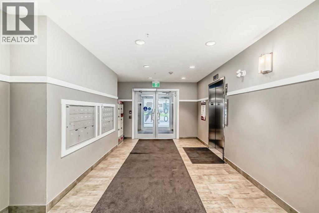 404, 100 Harvest Hills Place Ne, Calgary, Alberta  T3K 2M7 - Photo 4 - A2258585