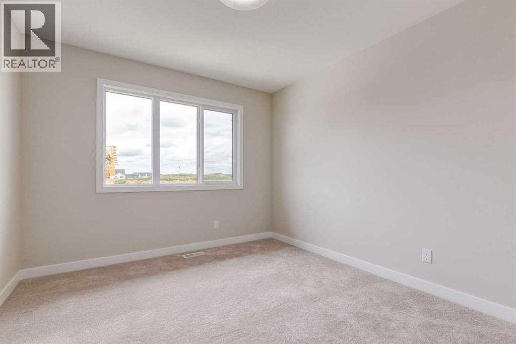 82 Agate Road, Cochrane, Alberta  T4C 3K1 - Photo 25 - A2264580