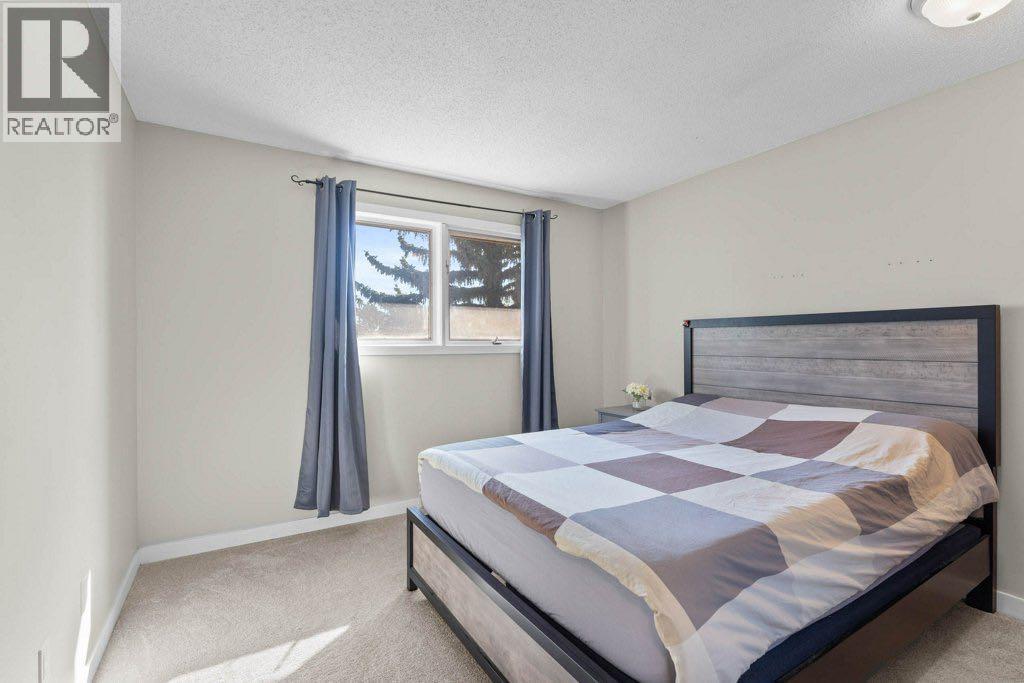 47 Woodmont Way Sw, Calgary, Alberta  T2W 4L7 - Photo 28 - A2260483