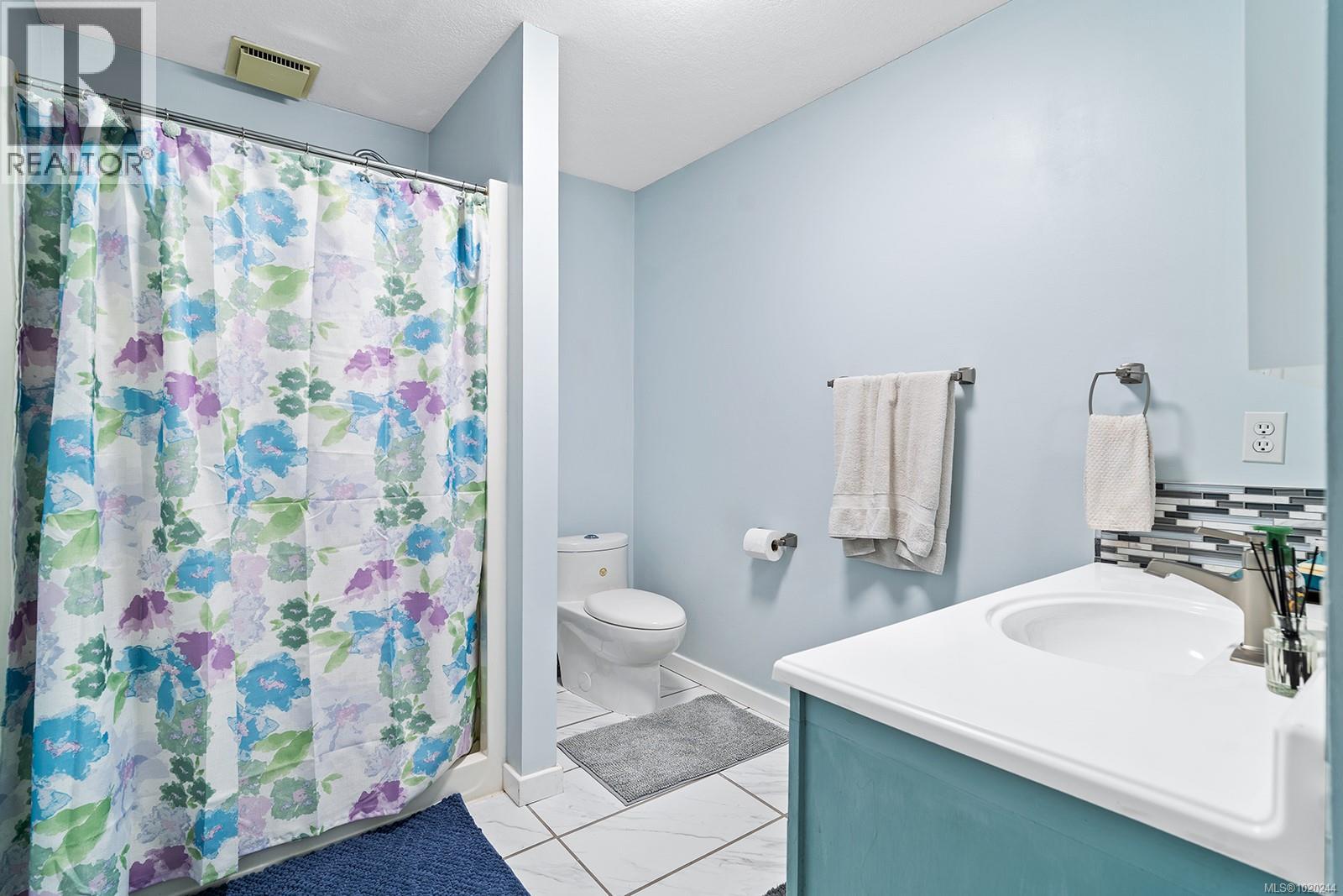 647 Tamarack Dr, Qualicum Beach, British Columbia  V9K 1A8 - Photo 15 - 1020244