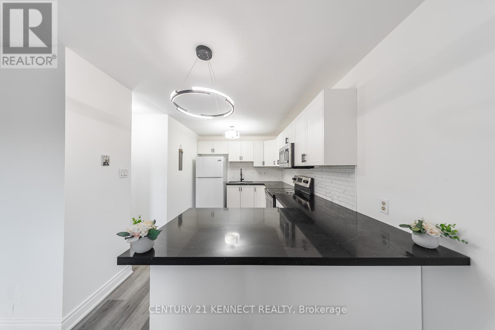 71 - 1030 Falgarwood Drive, Oakville, Ontario  L6H 2P5 - Photo 9 - W12533404