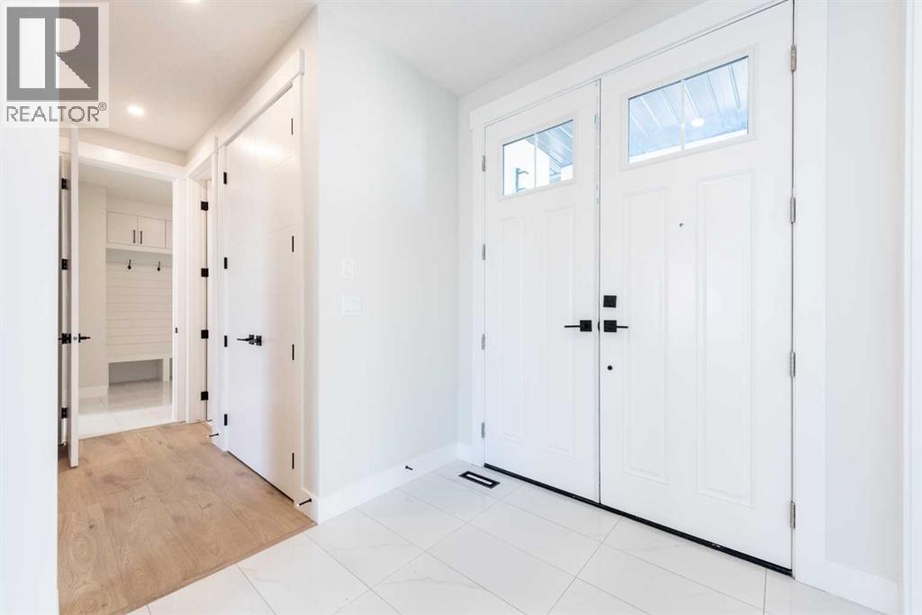 22 Cimarron Estates Gate, Okotoks, Alberta  T1S 0M9 - Photo 8 - A2268074