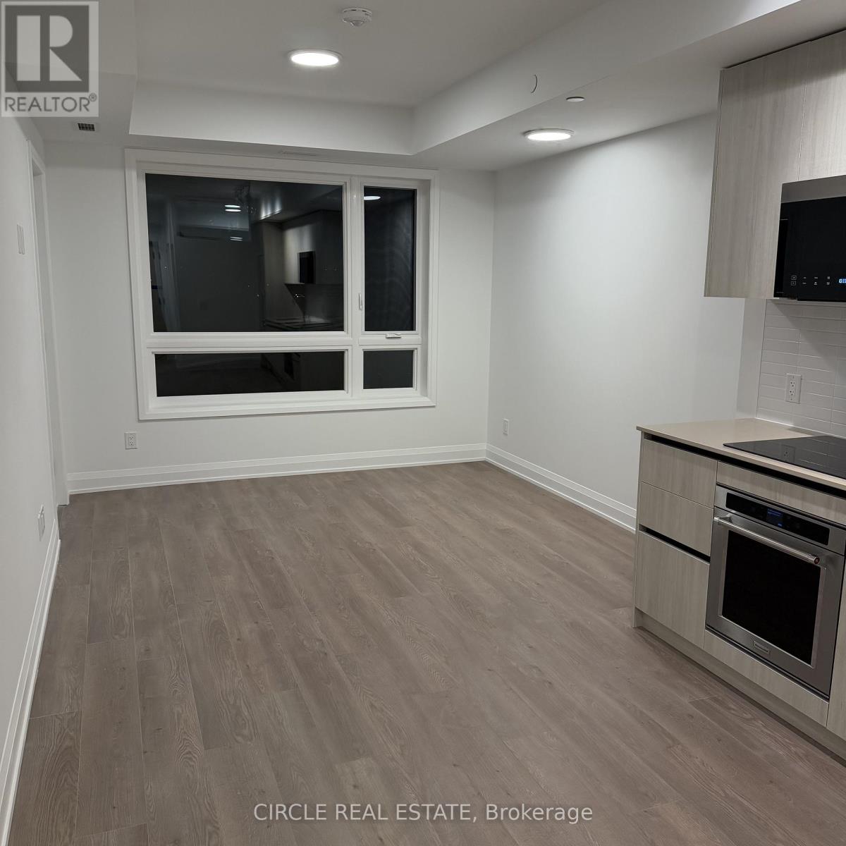 415 - 3250 Carding Mill Trail, Oakville, Ontario  L6M 1L3 - Photo 4 - W12533582