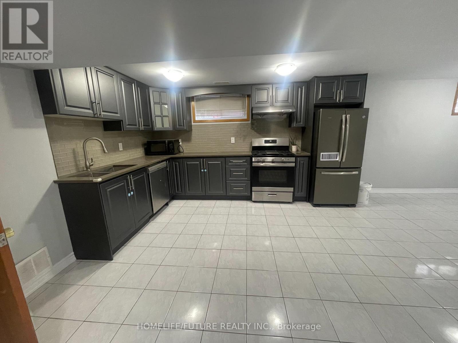 Bsmt - 311 Huntsmill Boulevard, Toronto, Ontario M1W 3C9 - Photo 3 - E12514336