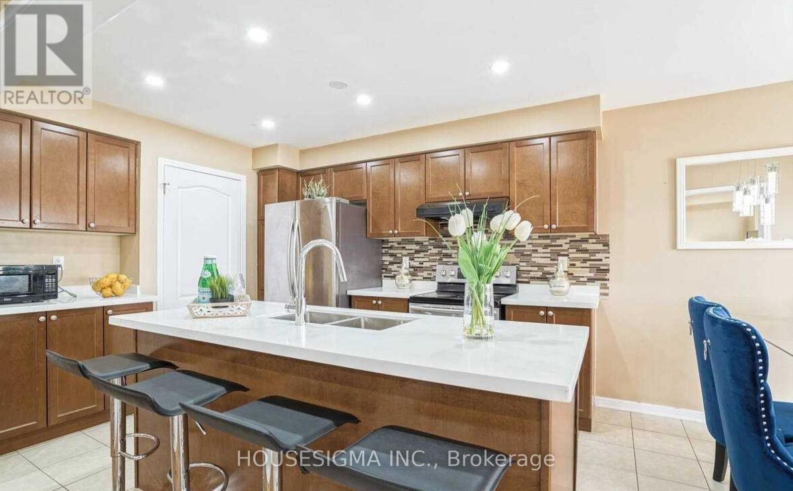 57 Robert Parkinson Drive, Brampton, Ontario  L7A 0X5 - Photo 5 - W12534002