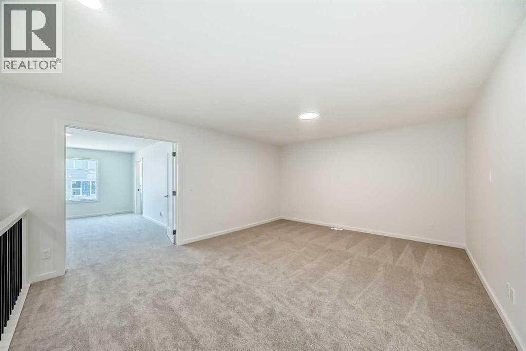 33 Royston Grove Nw, Calgary, Alberta  T3L 0M3 - Photo 19 - A2262825