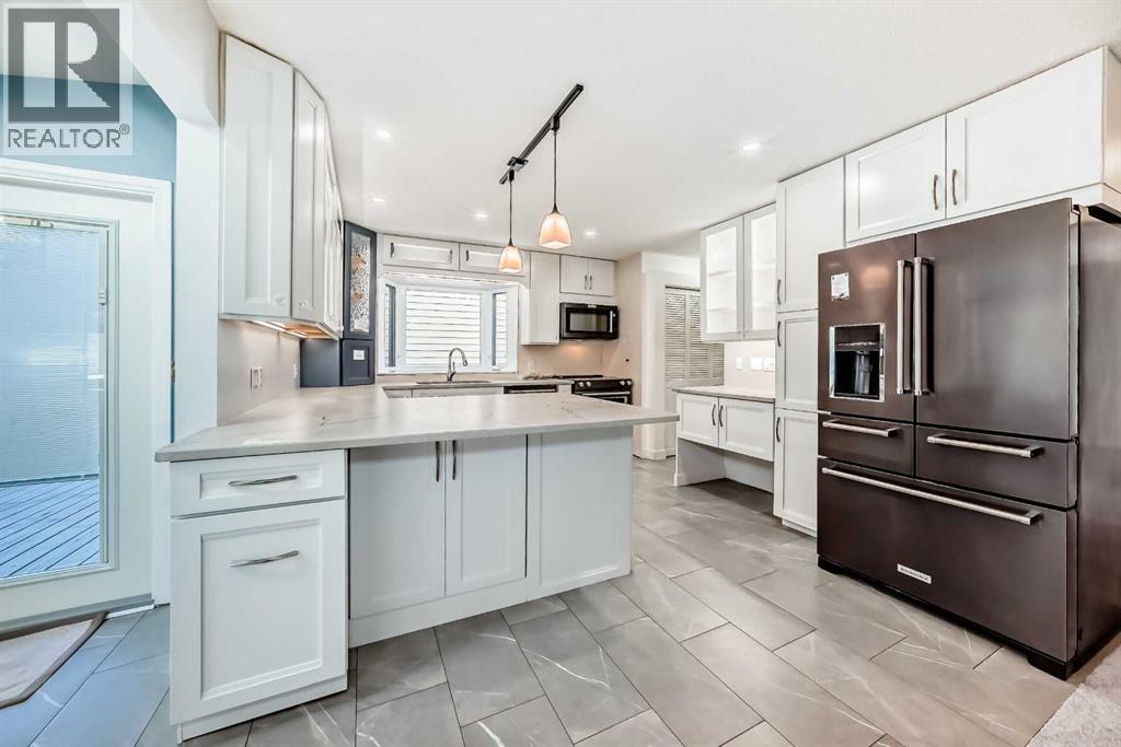 6628 Ranchview Drive Nw, Calgary, Alberta  T1Y 1T1 - Photo 4 - A2253235