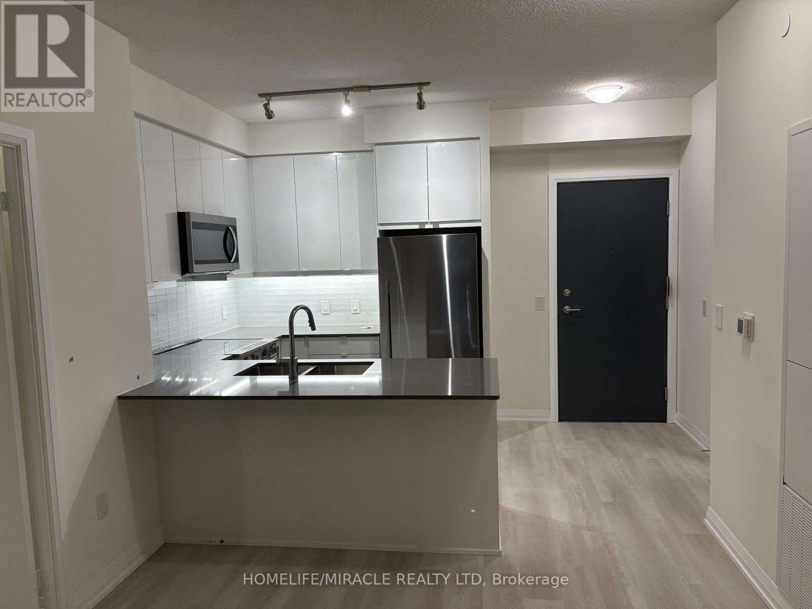 704 - 3260 Sheppard Avenue E, Toronto, Ontario  M1T 3K3 - Photo 3 - E12534424