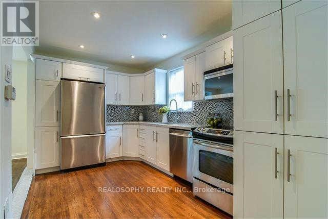 Upper - 827 Kingston Road, Toronto, Ontario  M4E 1R9 - Photo 6 - E12534546