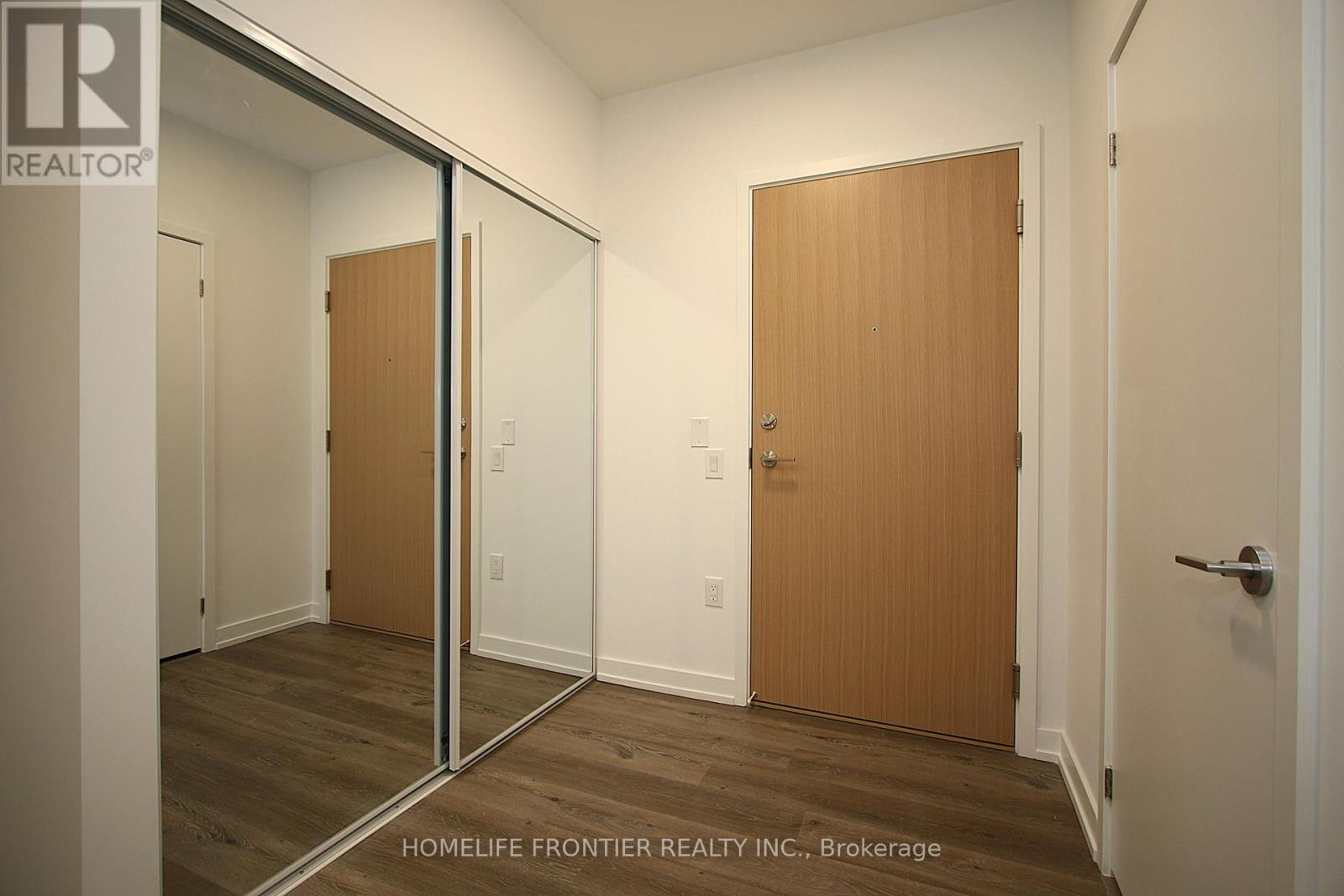 405 - 395 Square One Drive, Mississauga, Ontario  L5B 0P6 - Photo 2 - W12534356