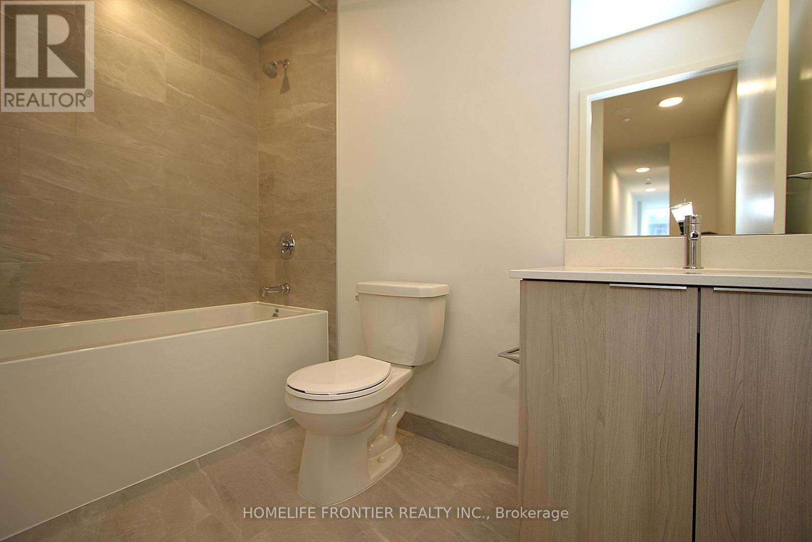 405 - 395 Square One Drive, Mississauga, Ontario  L5B 0P6 - Photo 4 - W12534356