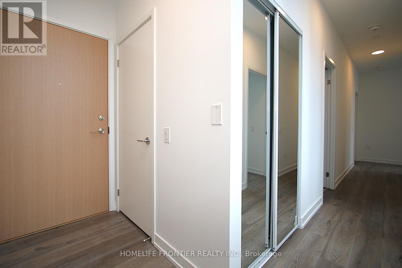 202 - 395 Square One Drive, Mississauga, Ontario  L5B 0P6 - Photo 2 - W12534510