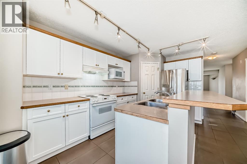 9747 Harvest Hills Link Ne, Calgary, Alberta  T5T 5T5 - Photo 11 - A2261194