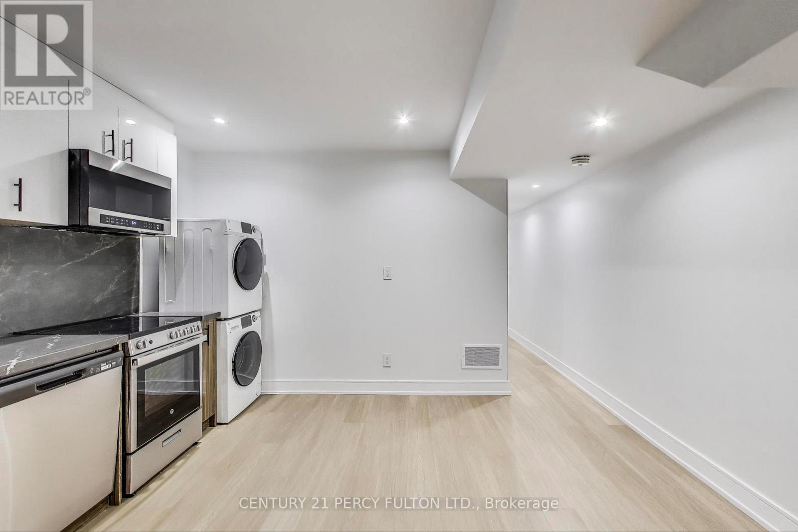 3 - 18 Springhurst Avenue, Toronto, Ontario  M6K 1A9 - Photo 3 - W12534814