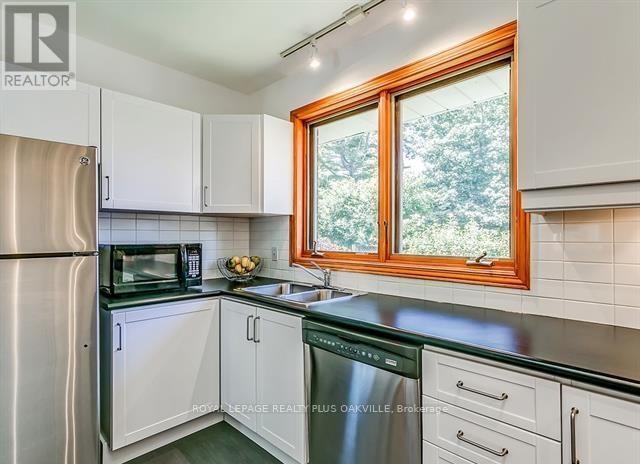 186 Tweedsdale Crescent, Oakville, Ontario  L6L 4P7 - Photo 18 - W12534944