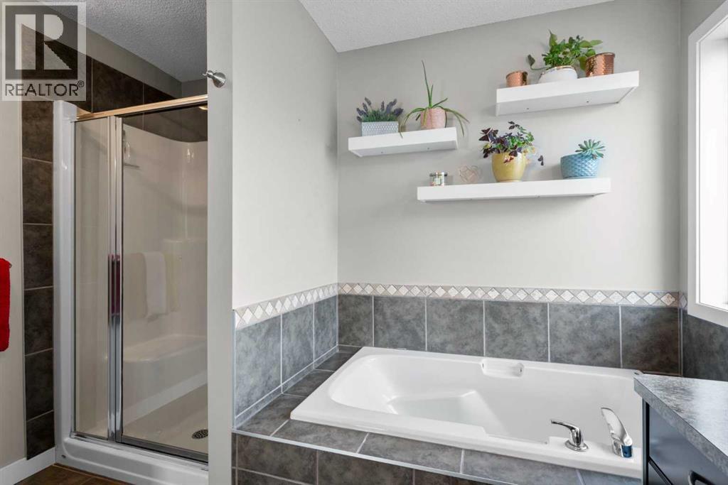 2581 Coopers Circle Sw, Airdrie, Alberta  T4B 3B7 - Photo 29 - A2266136