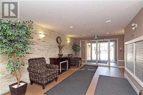 303 - 8 Dayspring Circle, Brampton, Ontario  L6P 2Z7 - Photo 2 - W12499268