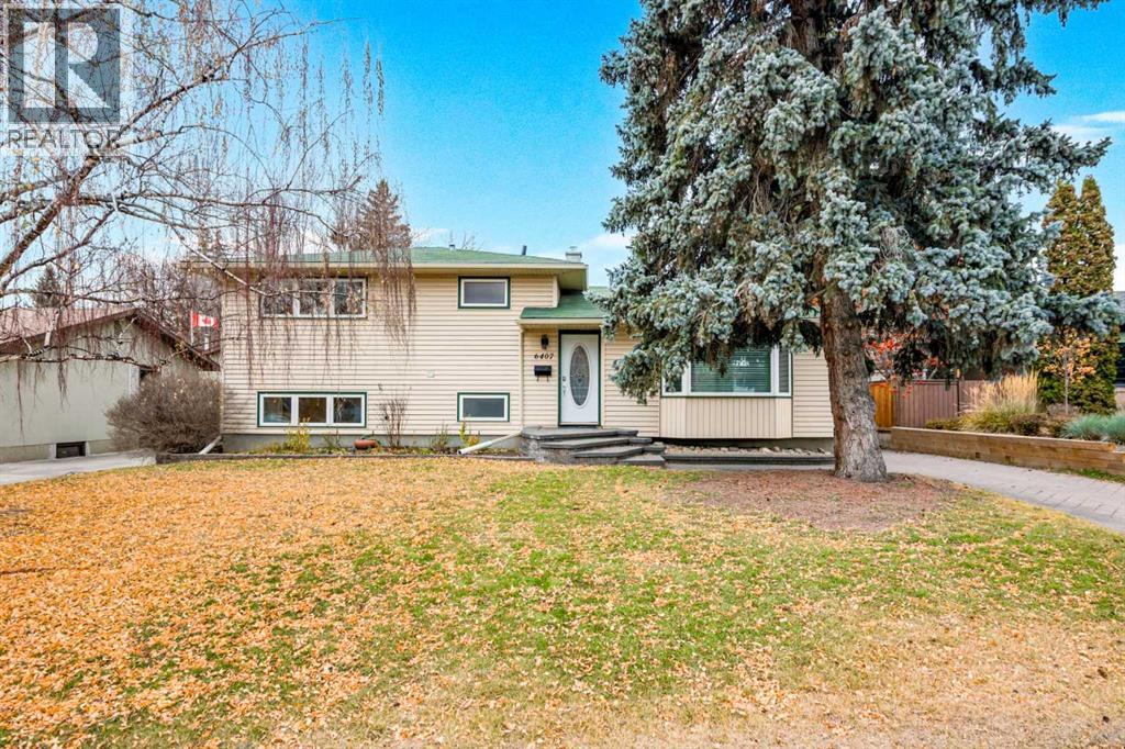 6407 Lombardy Crescent Sw, Calgary, Alberta  T3E 5R3 - Photo 1 - A2269733
