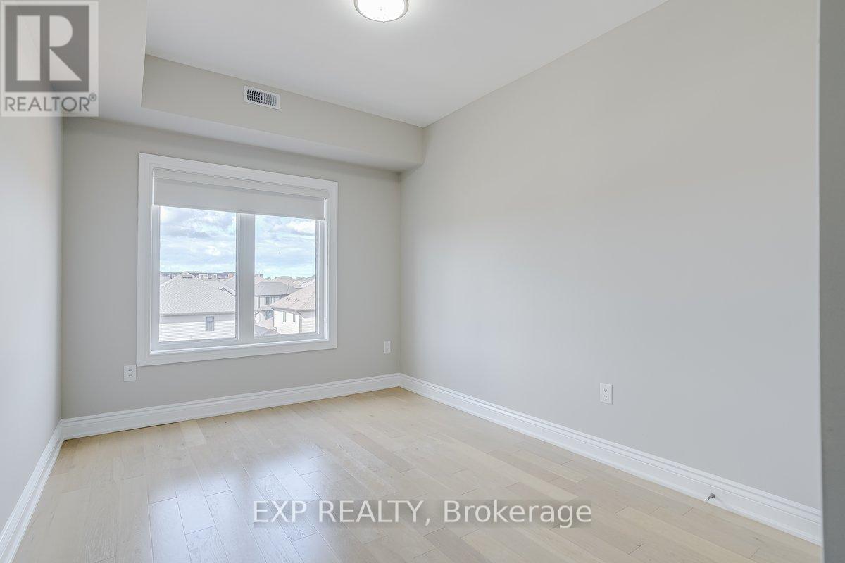 305 - 163 Port Robinson Road, Pelham, Ontario  L3B 5N5 - Photo 5 - X12535426