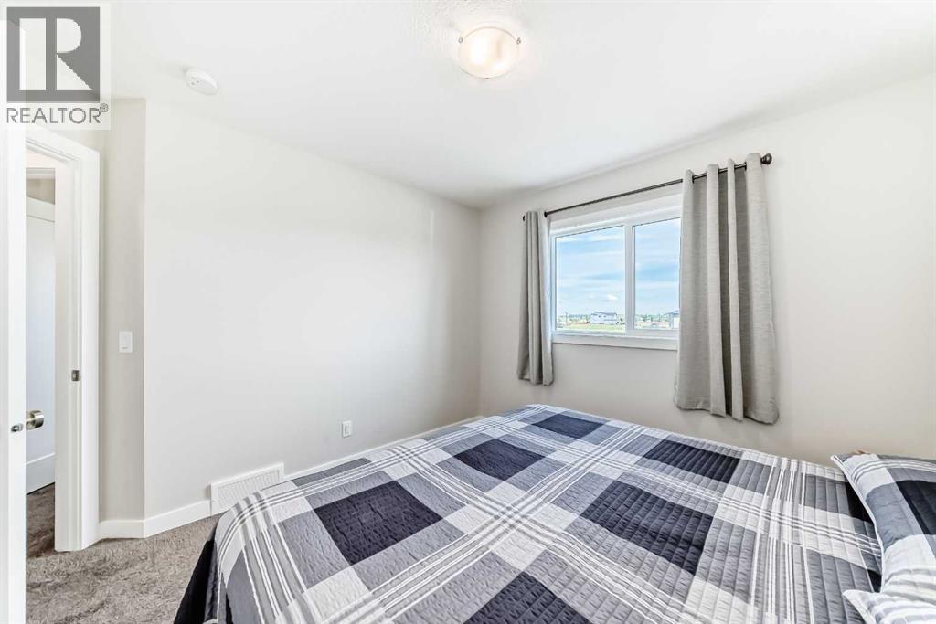 820 Hampshire Crescent Ne, High River, Alberta  T1V 0E4 - Photo 26 - A2239853