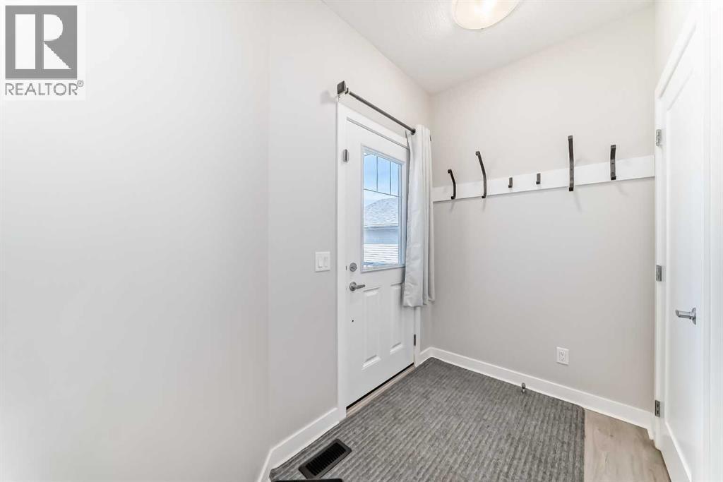 820 Hampshire Crescent Ne, High River, Alberta  T1V 0E4 - Photo 4 - A2239853