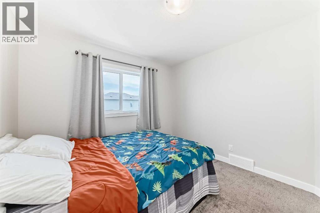 820 Hampshire Crescent Ne, High River, Alberta  T1V 0E4 - Photo 23 - A2239853