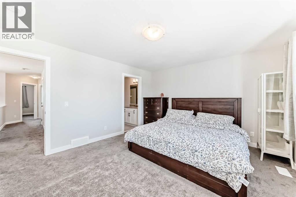 820 Hampshire Crescent Ne, High River, Alberta  T1V 0E4 - Photo 20 - A2239853