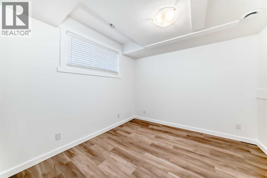 820 Hampshire Crescent Ne, High River, Alberta  T1V 0E4 - Photo 35 - A2239853