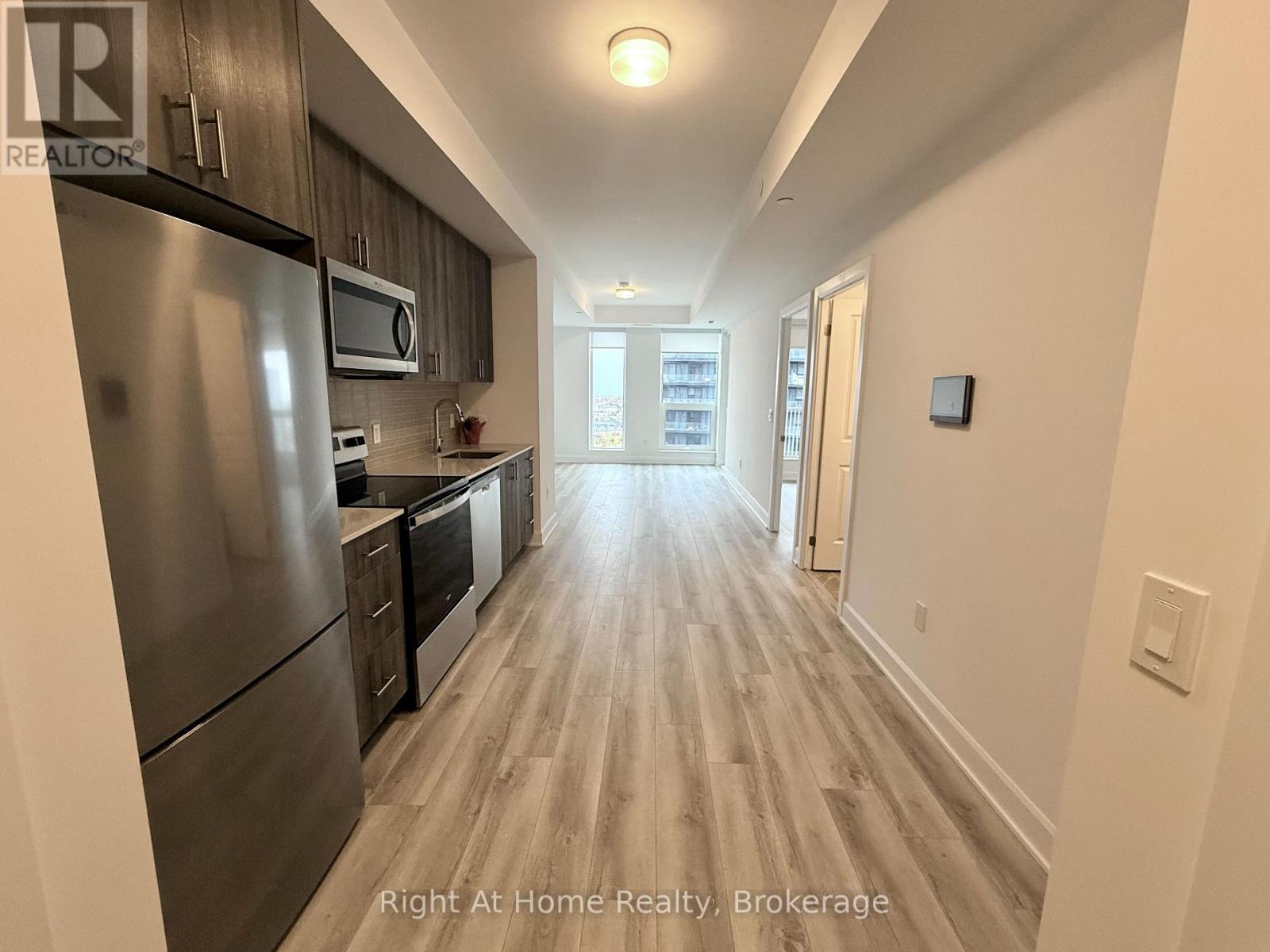 1609 - 3240 William Coltson Avenue, Oakville, Ontario  L6H 8C8 - Photo 4 - W12535518