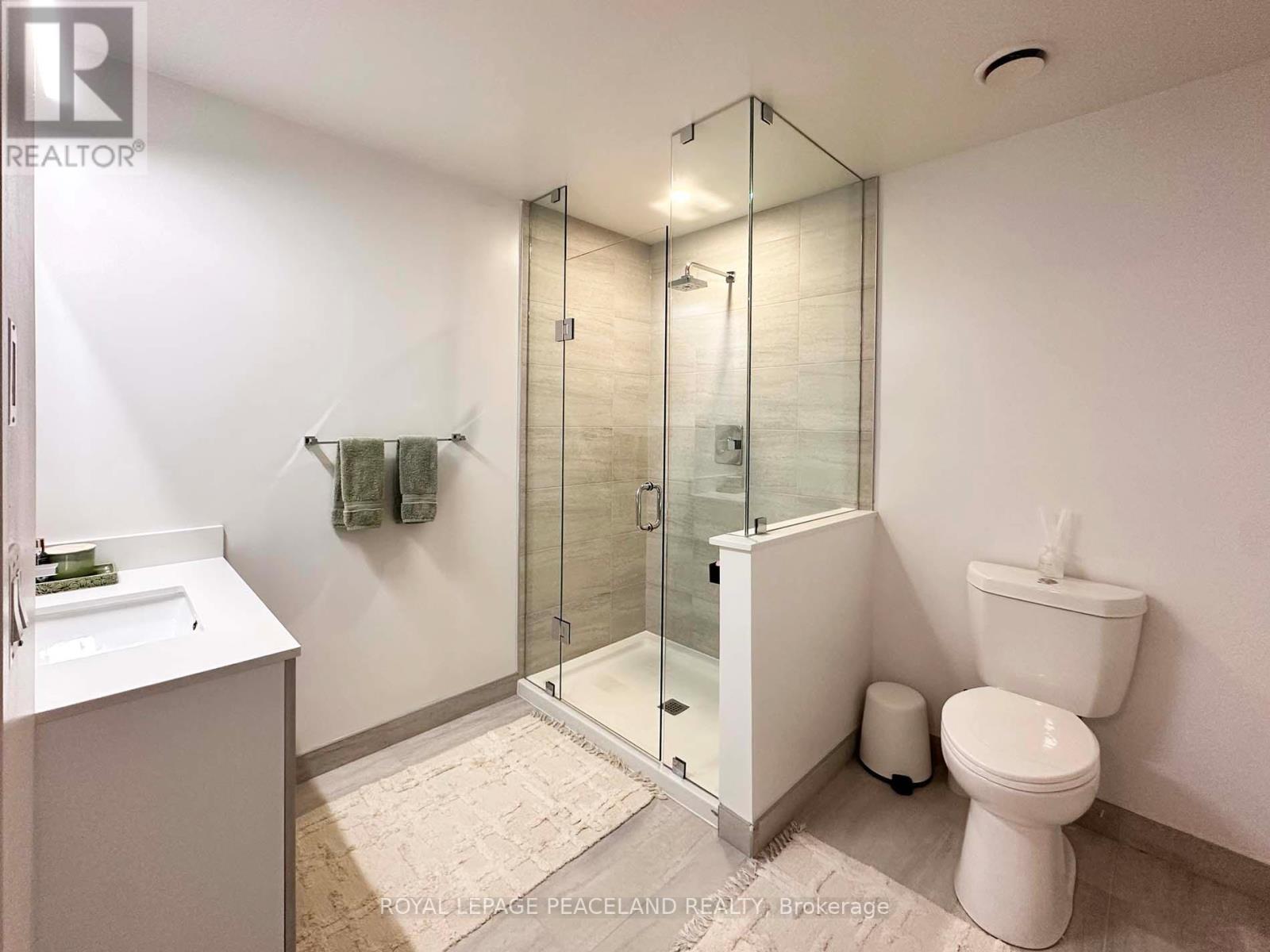 1003 - 18 Water Walk Drive, Markham, Ontario  L3R 6L5 - Photo 10 - N12535564