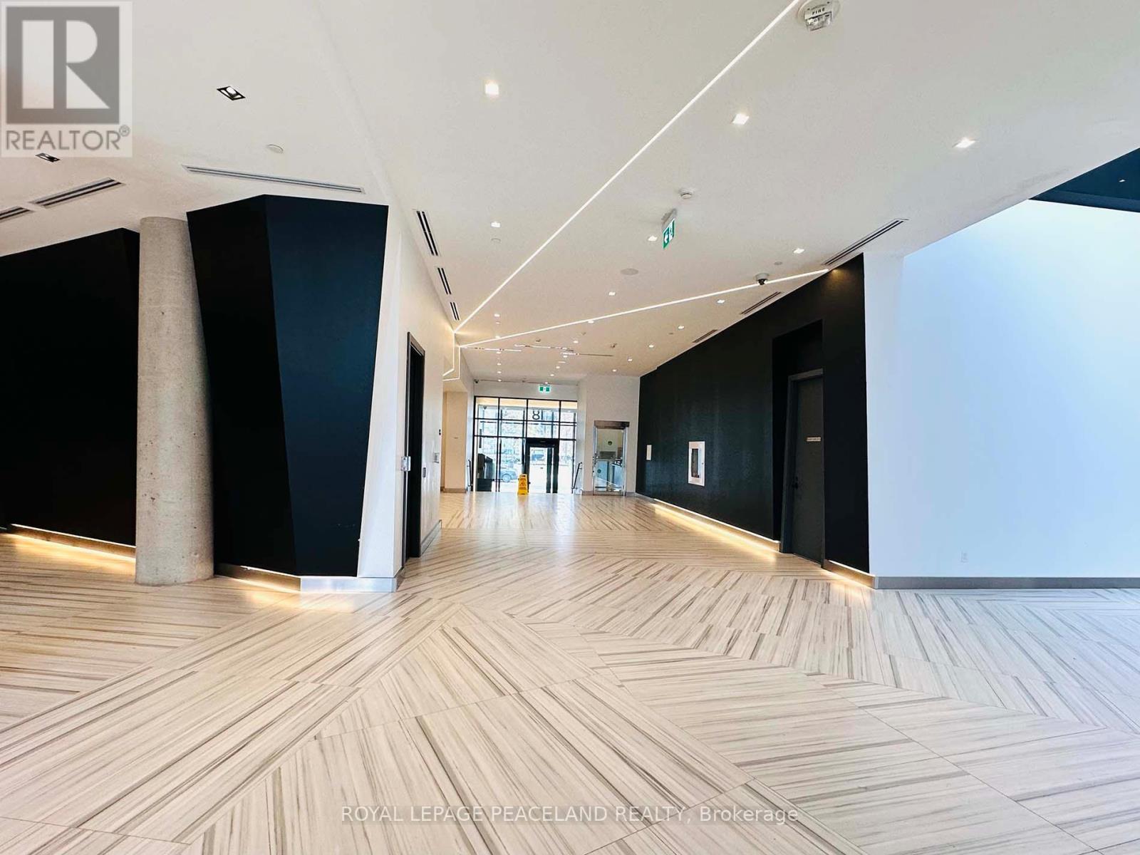 1003 - 18 Water Walk Drive, Markham, Ontario  L3R 6L5 - Photo 3 - N12535564