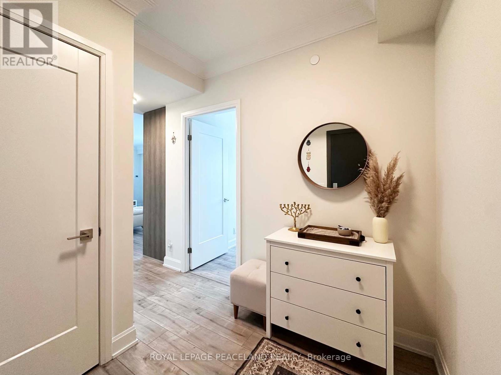 1003 - 18 Water Walk Drive, Markham, Ontario  L3R 6L5 - Photo 4 - N12535564