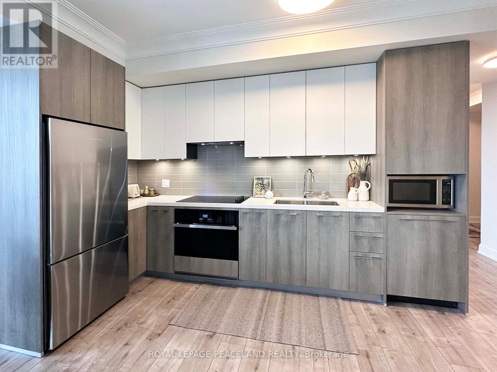 1003 - 18 Water Walk Drive, Markham, Ontario  L3R 6L5 - Photo 7 - N12535564