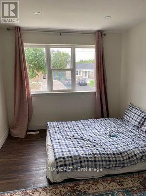 7117 Justine Drive, Mississauga, Ontario  L4T 1M6 - Photo 5 - W12535616