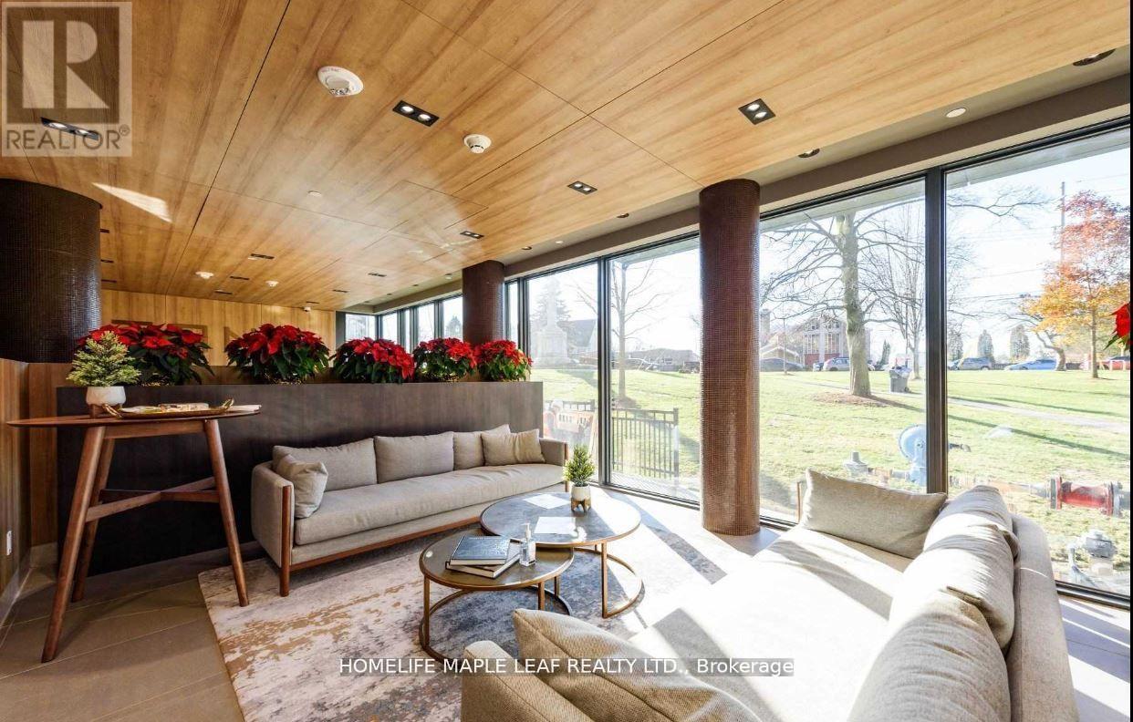 311 - 21 Park Street E, Mississauga, Ontario  L5G 1L7 - Photo 2 - W12536058