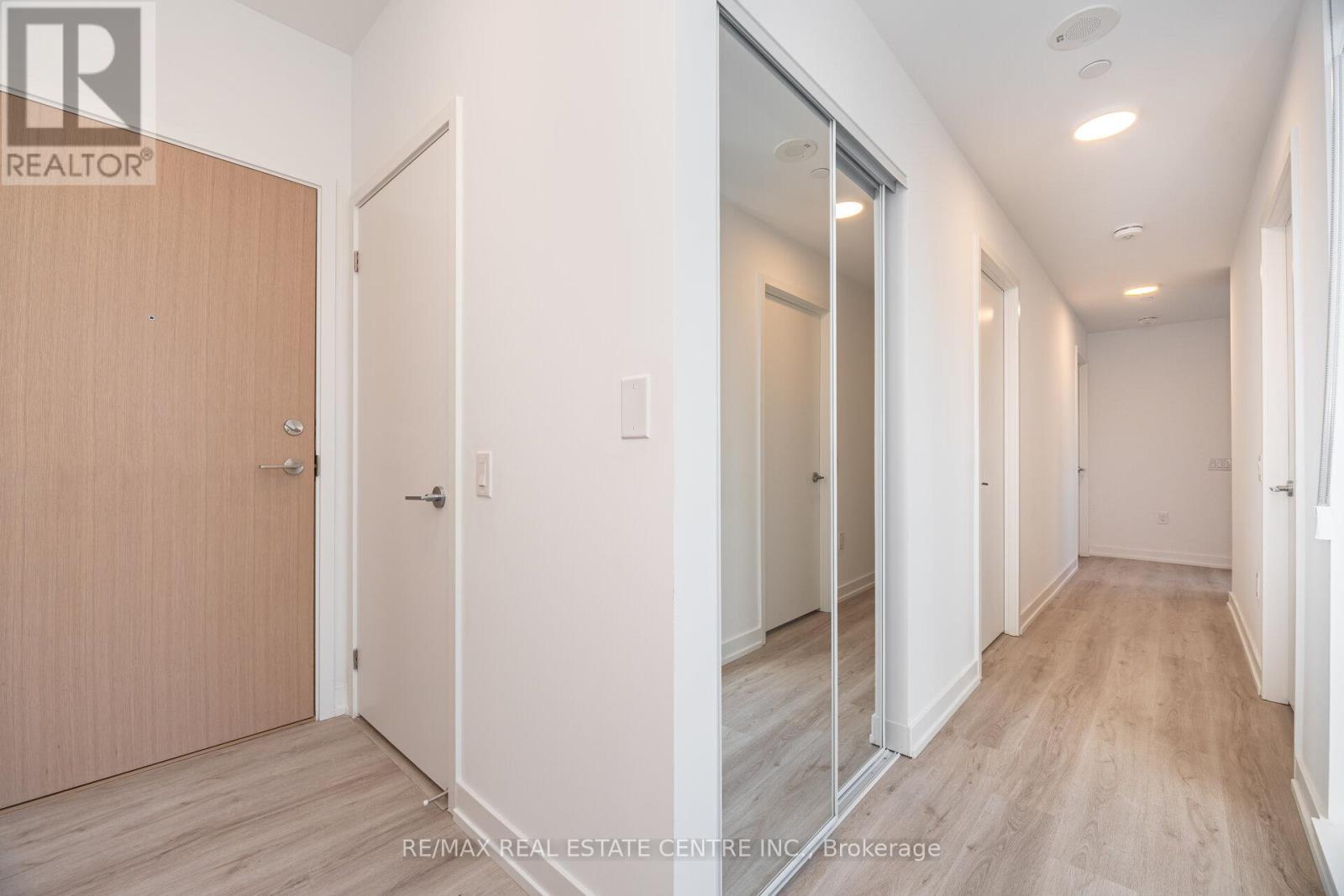 703 - 395 Square One Drive, Mississauga, Ontario  L5B 0P6 - Photo 7 - W12536310