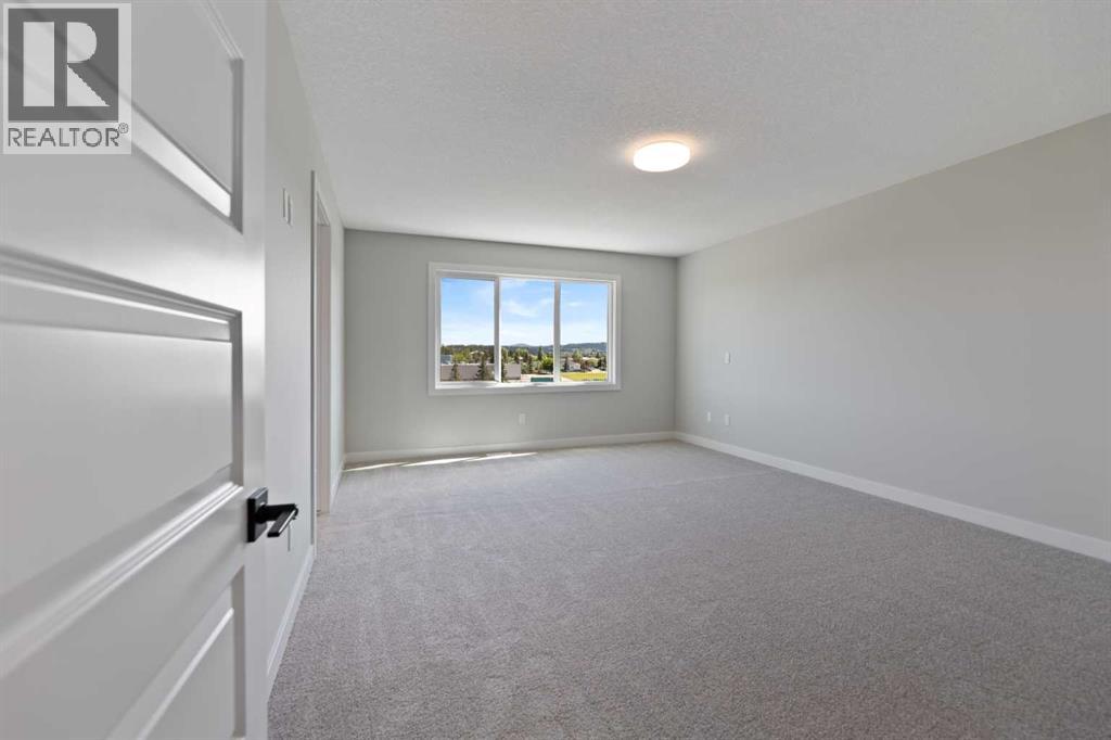 71 Saddlebred Place, Cochrane, Alberta  T4C 3E7 - Photo 19 - A2238697