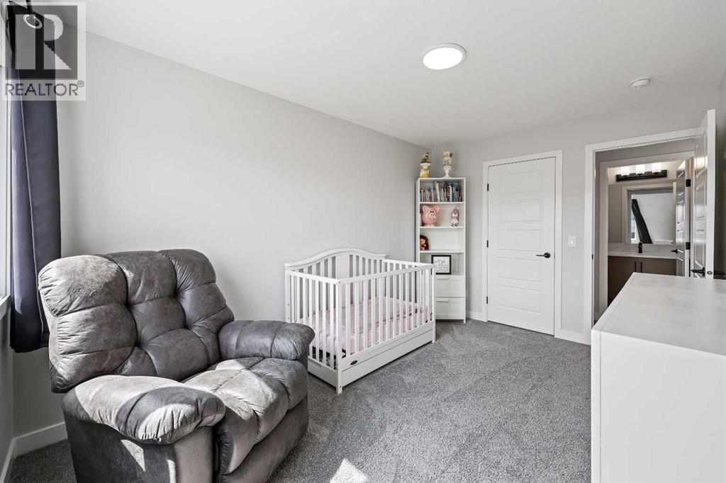 83 Wolf Creek Rise Se, Calgary, Alberta  T2X 4Z2 - Photo 32 - A2247575