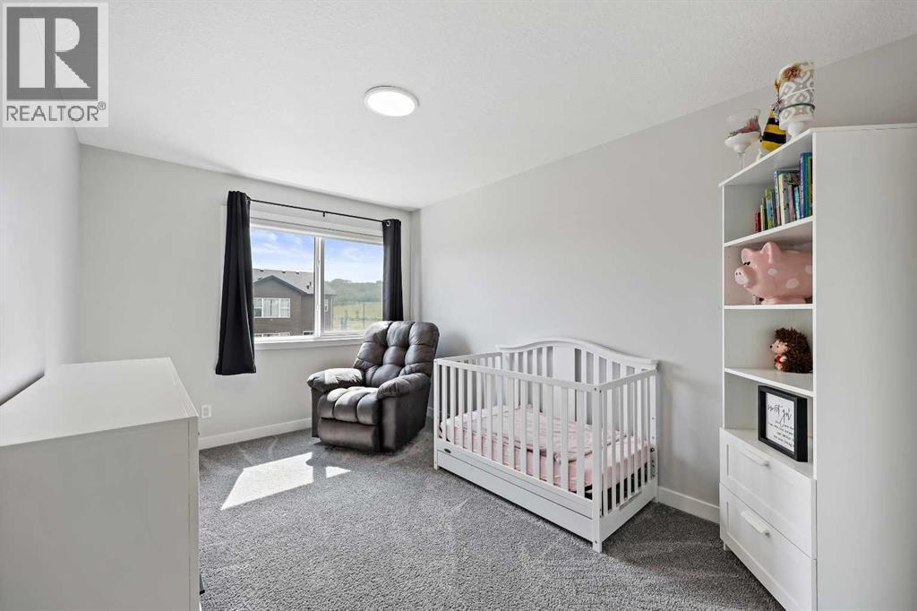 83 Wolf Creek Rise Se, Calgary, Alberta  T2X 4Z2 - Photo 31 - A2247575