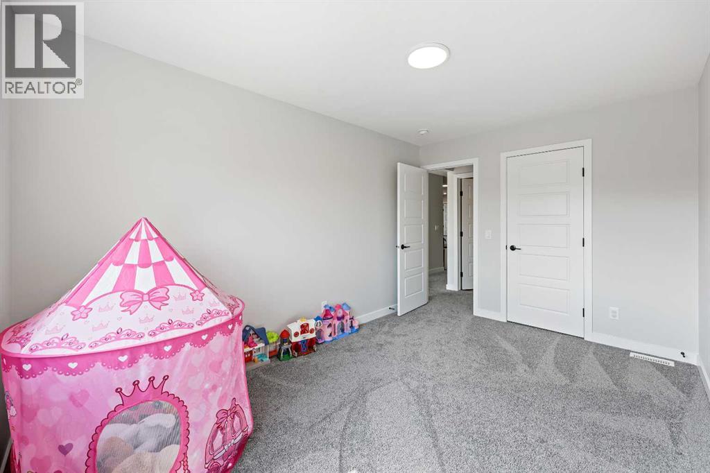 83 Wolf Creek Rise Se, Calgary, Alberta  T2X 4Z2 - Photo 35 - A2247575