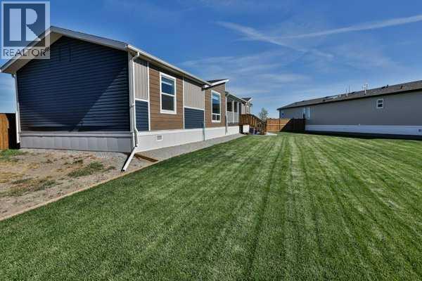 2037 Sunflower Crescent, Coaldale, Alberta  T1M 0G4 - Photo 5 - A2259171