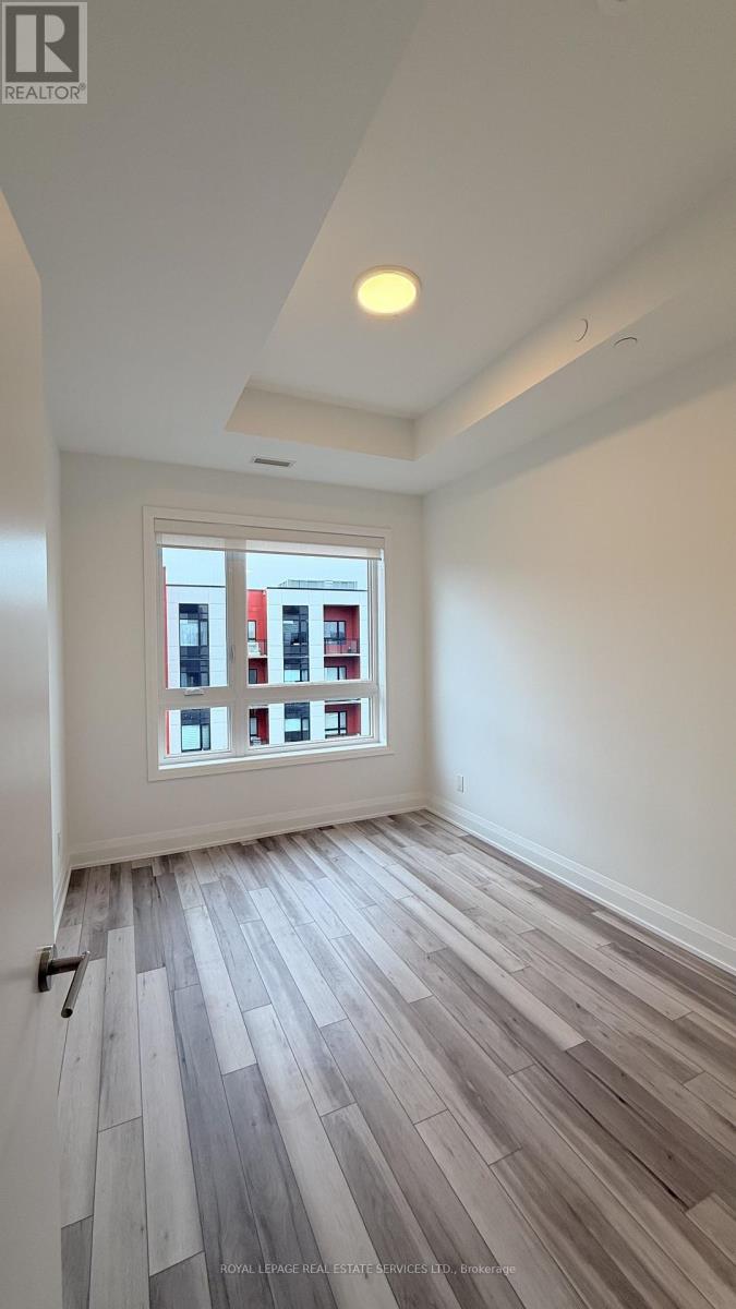 523 - 3250 Carding Mill Trail, Oakville, Ontario  L6M 1L3 - Photo 4 - W12537222