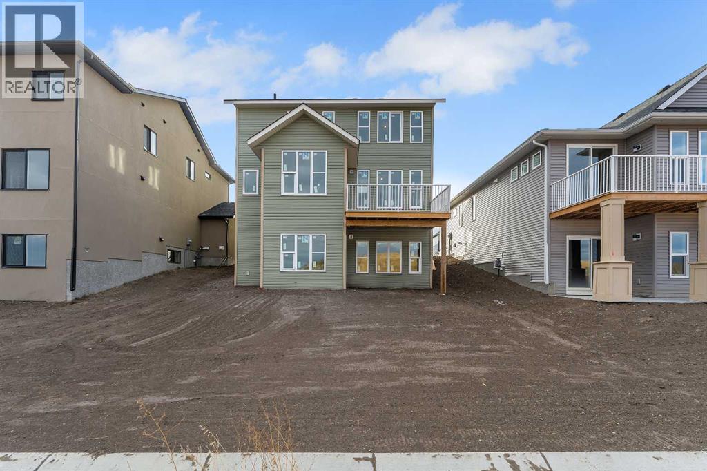 1172 Iron Ridge Avenue, Crossfield, Alberta  T0M 0S0 - Photo 2 - A2268768