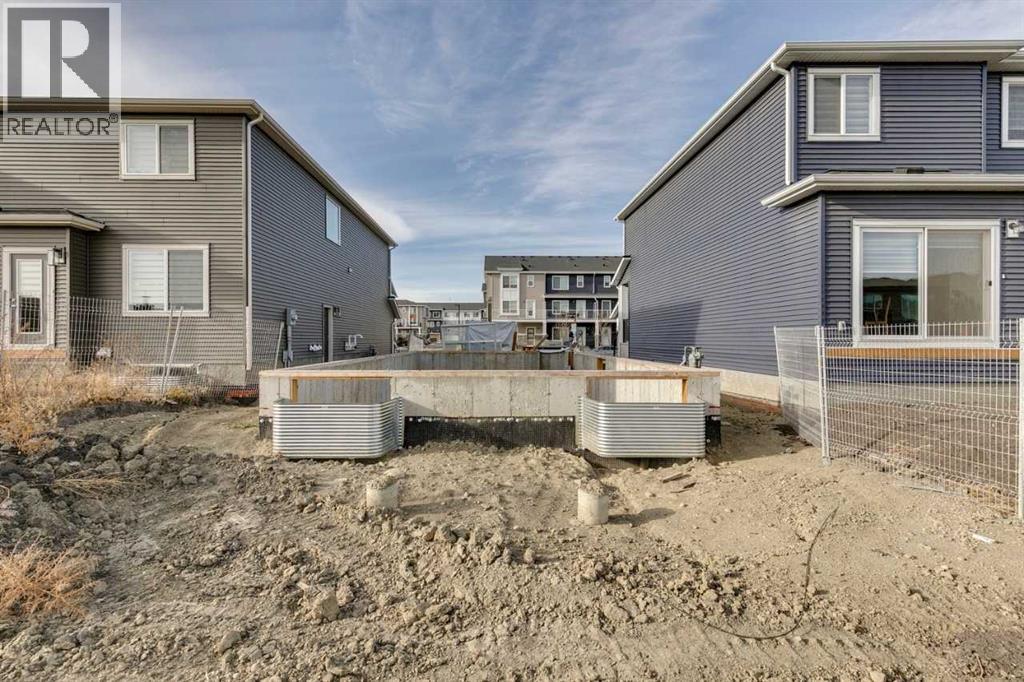 134 Belmont Passage Sw, Calgary, Alberta  T0L 0X0 - Photo 3 - A2241837