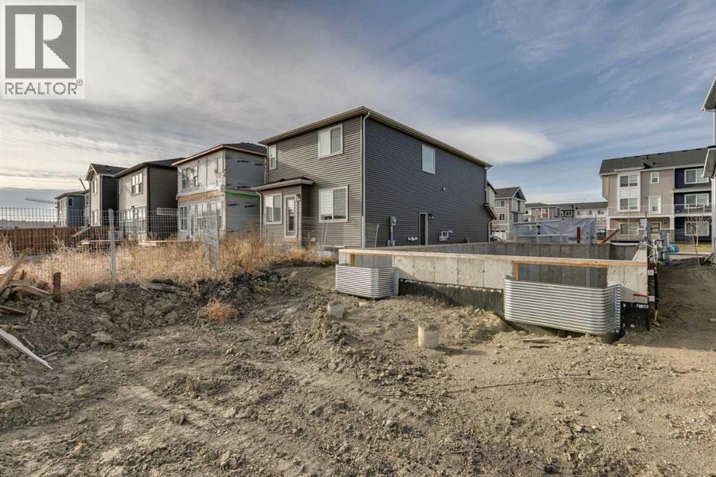 134 Belmont Passage Sw, Calgary, Alberta  T0L 0X0 - Photo 4 - A2241837