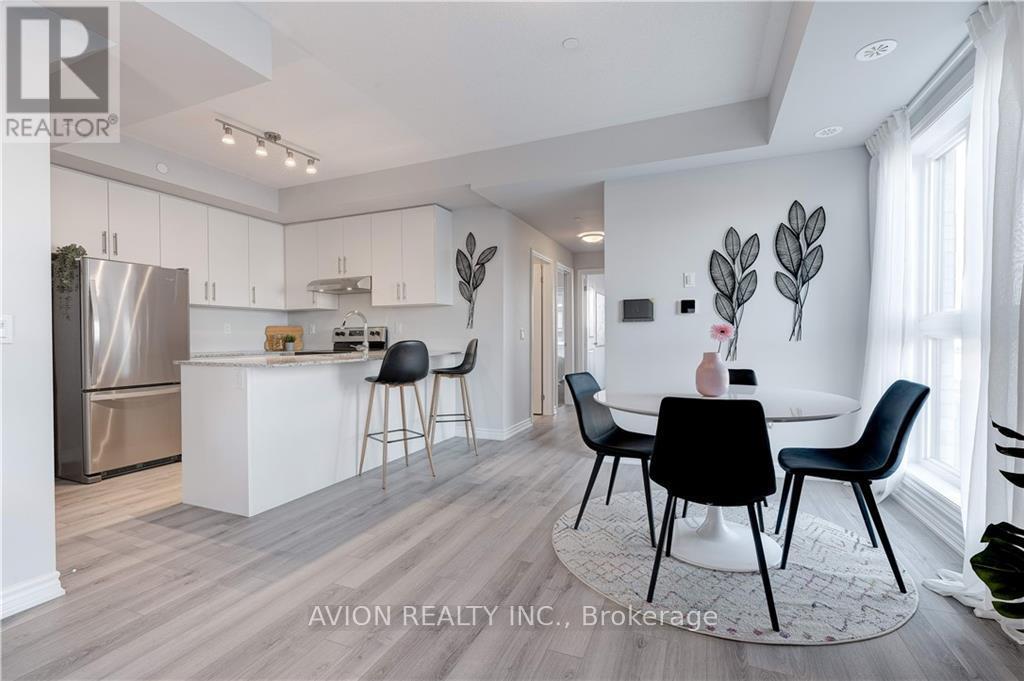 202 - 349 Wheat Boom Drive, Oakville, Ontario  L6H 7X5 - Photo 3 - W12537406