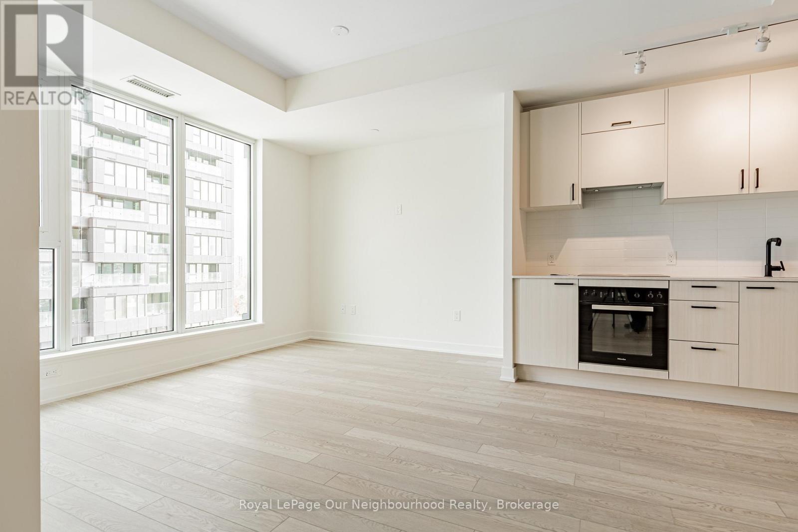 711 - 1 Quarrington Lane, Toronto, Ontario  M3C 0S4 - Photo 5 - C12537470