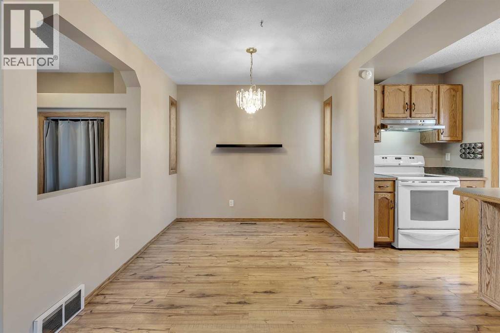 87 Coventry Road Ne, Calgary, Alberta  T3K 5K4 - Photo 5 - A2267461